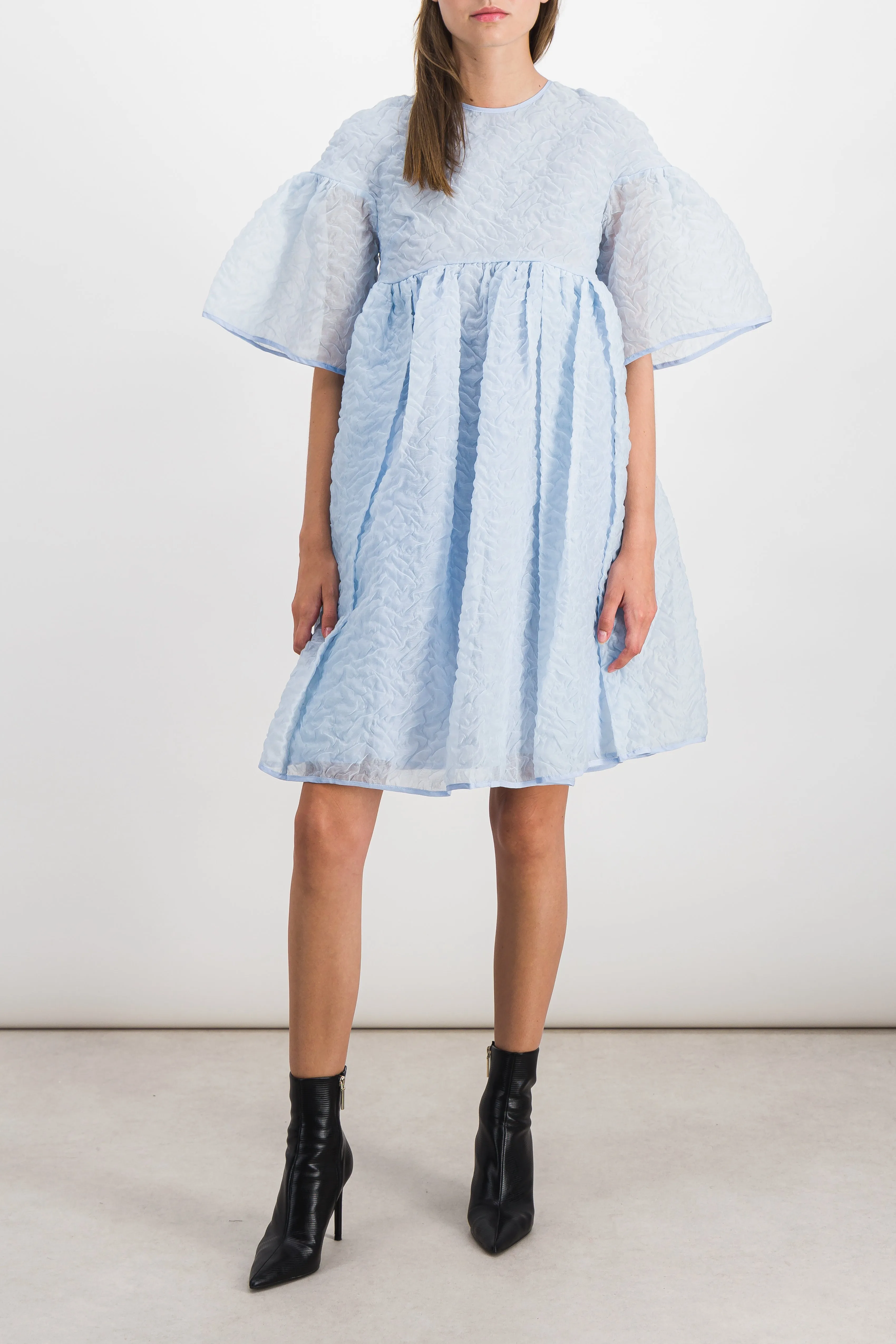 Nimbus matelassé bell shaped dress with voluminous skirt